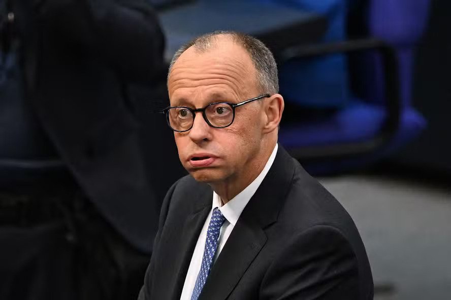 110951333-designated-german-chancellor-friedrich-merz-reacts-as-he-arrives-at-the-plenary-hall-for-t.jpeg