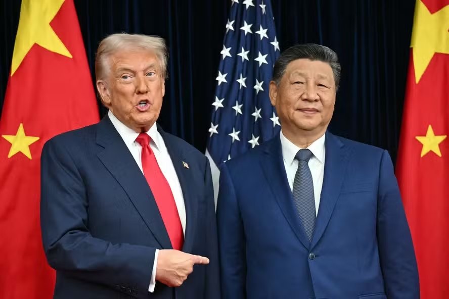 112859967-topshot-us-president-donald-trump-l-and-chinas-president-xi-jinping-greet-each-othe.jpg