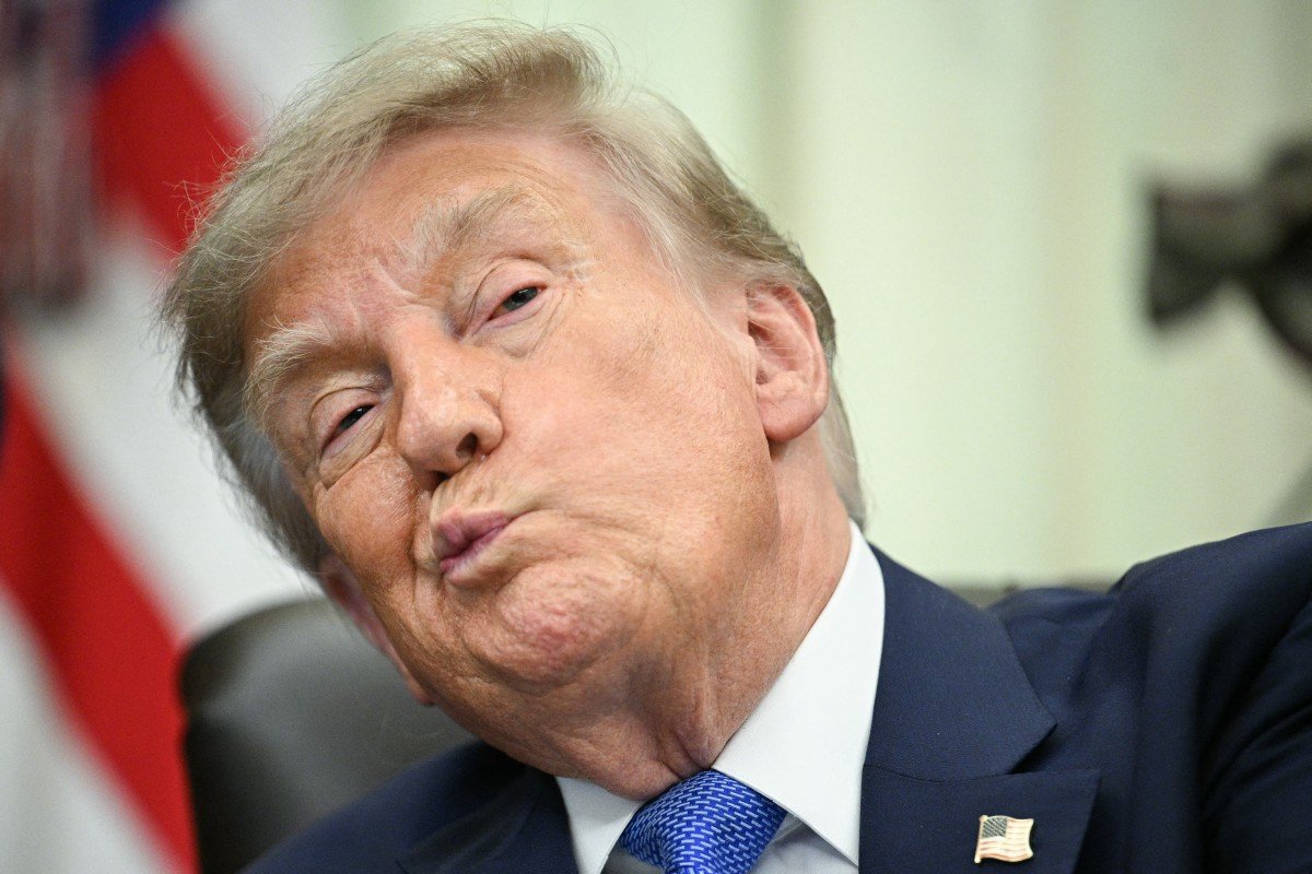 AFP__20260810__C4CJ7QL__v4__MidRes__UsPresidentDonaldTrumpSignsExecutiveOrderOnVacci.jpg