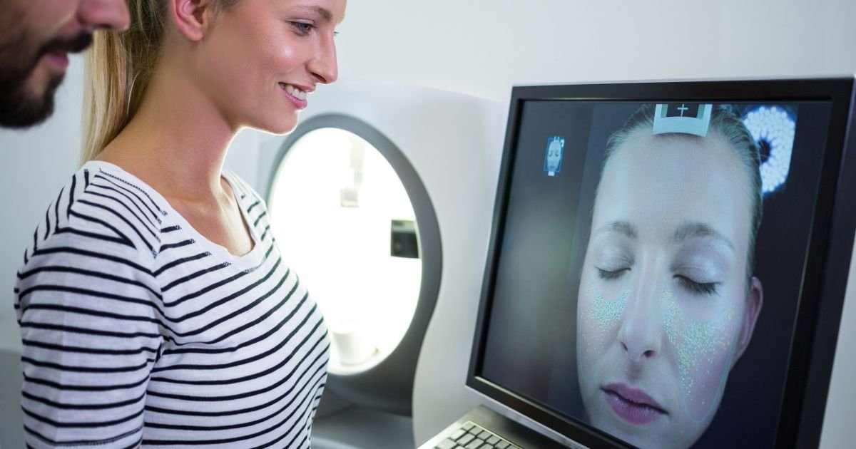 woman-looking-mri-scan-report-computer-screen.jpg